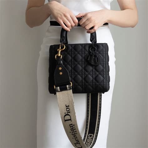 christian dior black top with white straps|Christian Dior lambskin shoulder strap.